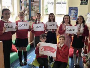 Norwich Road Academy pupils with Carer Friendly Tick Award certificate